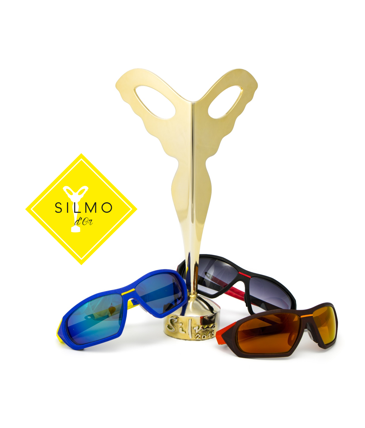 Three pairs of sunglasses sitting around an award