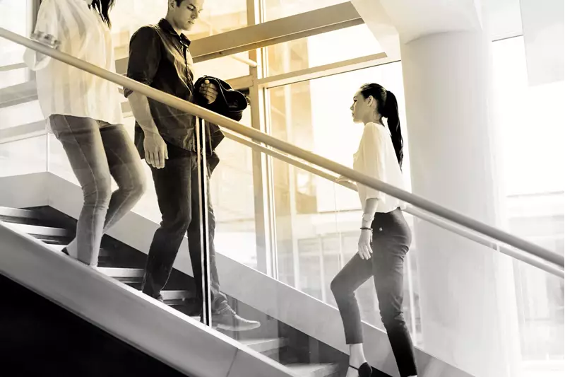 Female walking up a flight of stairs 