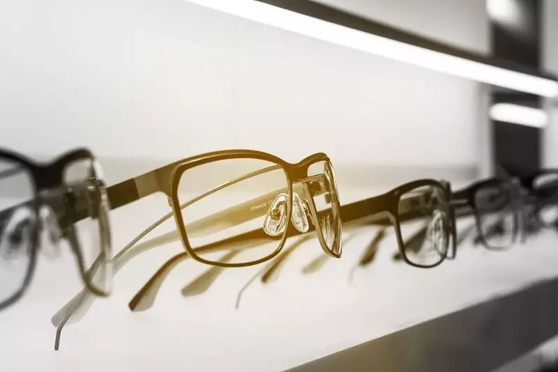 Eyeglass frames sitting in a display cabinet
