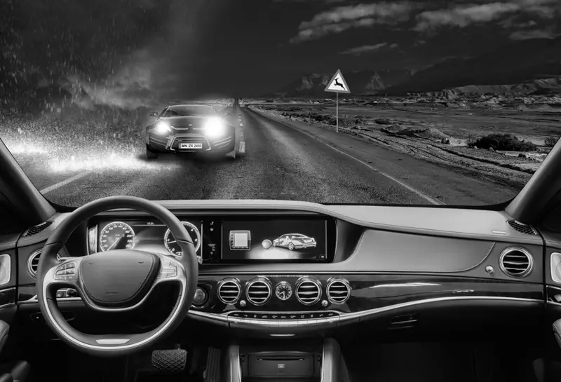 Black and white image of car dashboard 