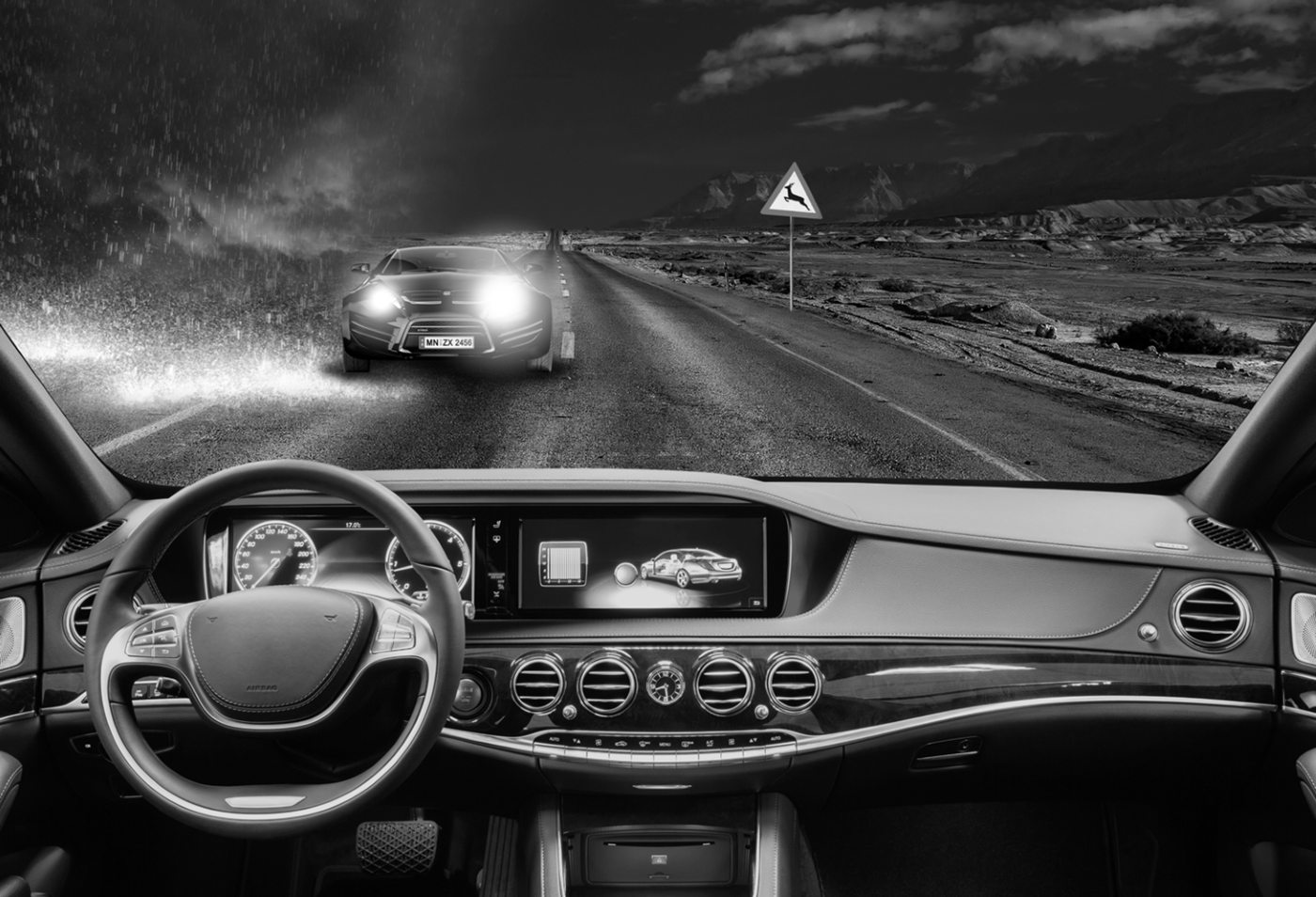 Black and white image of car dashboard 