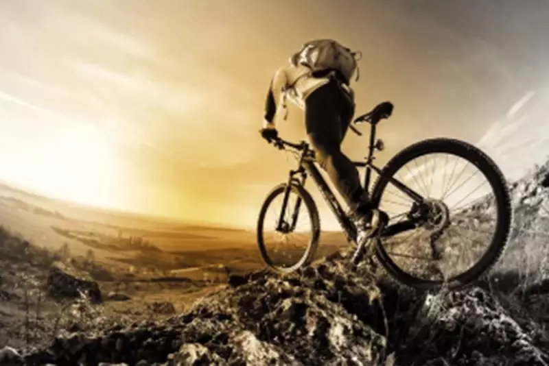 Male mountain biker on a track