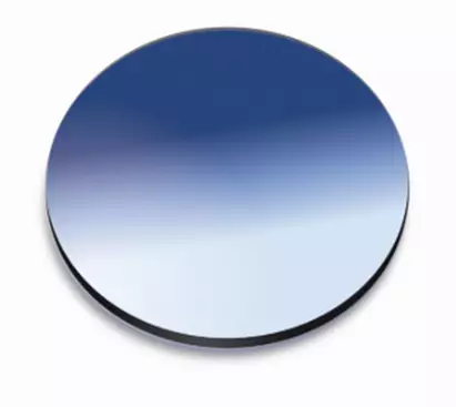Blue tinted eyeglass lens