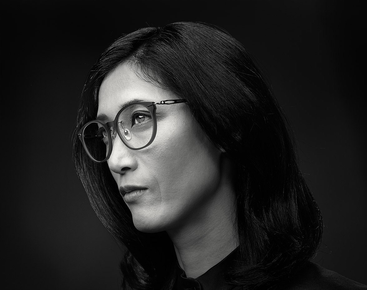Black and white image of female wearing eyeglasses 